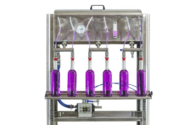 Manual bottle filling machine for liquids
